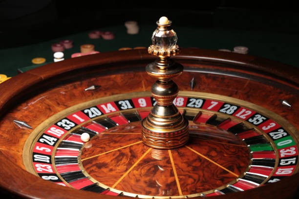 Live roulette table with spinning wheel and betting interface